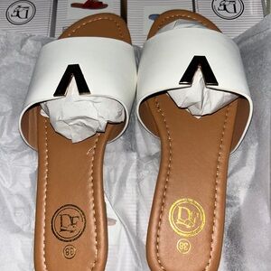White Slide Sandals with Gold V Accent by DE